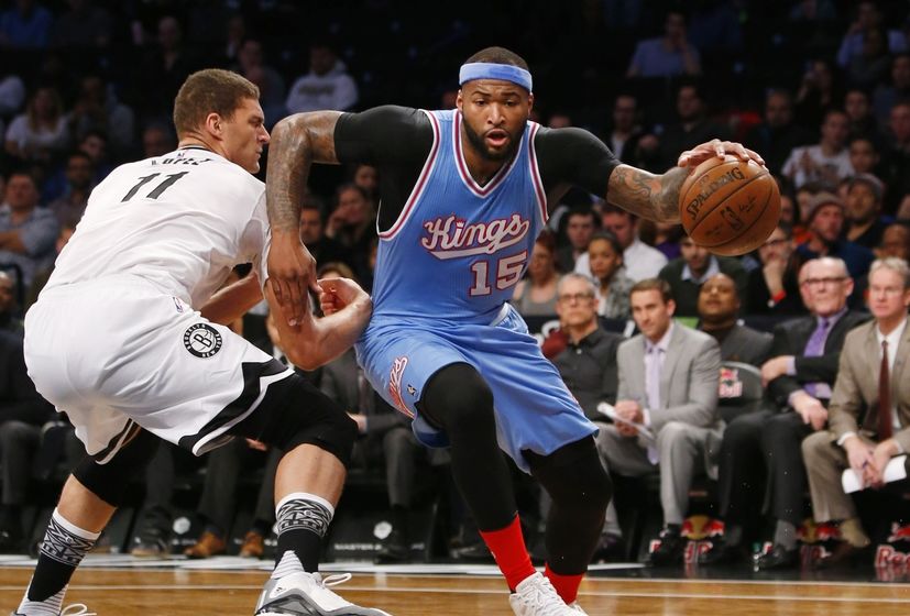 Feb 5, 2016; Brooklyn, NY, USA; Sacramento Kings center DeMarcus Cousins (15) drives to the basket against Brooklyn Nets center Brook Lopez (11) during the first half at Barclays Center. Mandatory Credit: Noah K. Murray-USA TODAY Sports