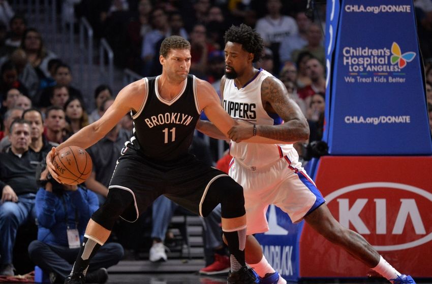 Feb 29, 2016; Los Angeles, CA, USA; Brooklyn Nets center Brook Lopez (11) is defended by Los Angeles Clippers center DeAndre Jordan (6) during an NBA game at the Staples Center. Mandatory Credit: Kirby Lee-USA TODAY Sports