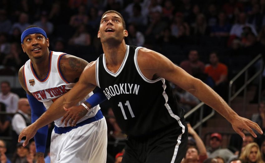 Oct 8, 2016; New York, NY, USA; Brooklyn Nets center Brook Lopez (11) defends New York Knicks forward Carmelo Anthony (7) during the first half at Madison Square Garden. Mandatory Credit: Adam Hunger-USA TODAY Sports