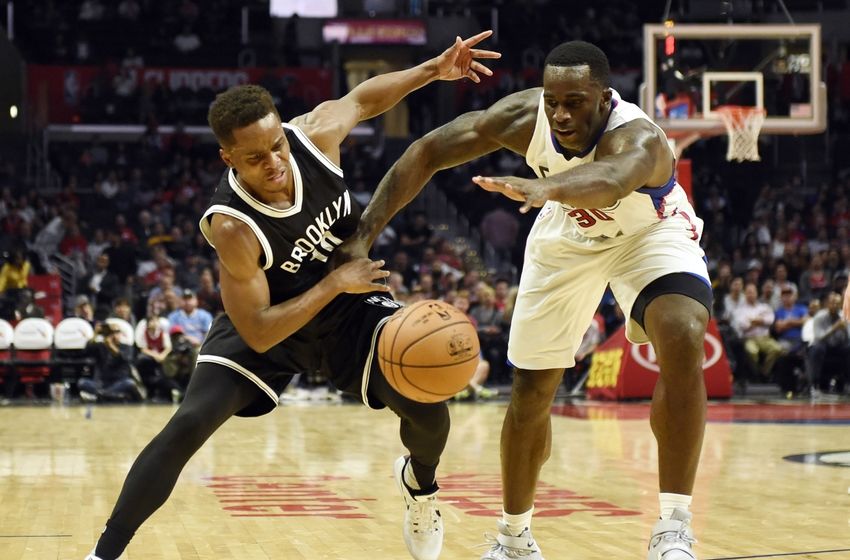 Nov 14, 2016; Los Angeles, CA, USA; Brooklyn Nets guard Yogi Ferrell (10) battles for the ball with Los Angeles Clippers forward Brandon Bass (30) in the second half of a NBA basketball game at Staples Center. Mandatory Credit: Richard Mackson-USA TODAY Sports