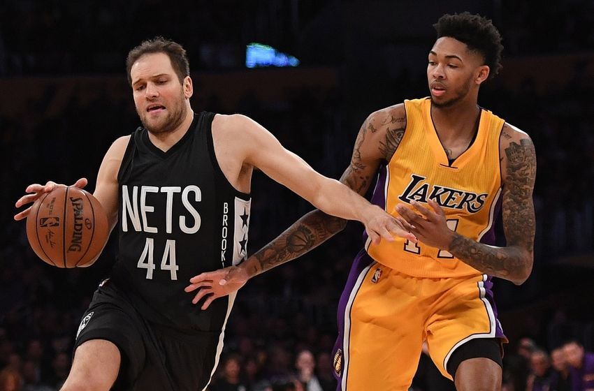 Nov 15, 2016; Los Angeles, CA, USA; Brooklyn Nets guard Bojan Bogdanovic (44) is fouled by Los Angeles Lakers forward Brandon Ingram (14) during a NBA basketball game at Staples Center. The Lakers defeated the Nets 125-118. Mandatory Credit: Kirby Lee-USA TODAY Sports
