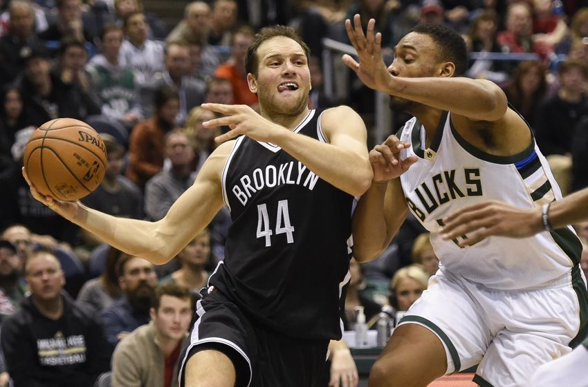 Dec 3, 2016; Milwaukee, WI, USA; Brooklyn Nets guard Bojan Bogdanovic (44) drives for the basket against Milwaukee Bucks forward Jabari Parker (12) in the fourth quarter at BMO Harris Bradley Center. Mandatory Credit: Benny Sieu-USA TODAY Sports