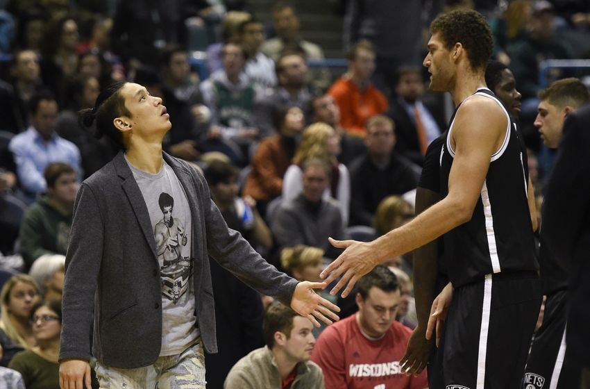Dec 3, 2016; Milwaukee, WI, USA; Brooklyn Nets guard Jeremy Lin (7) greets center Brook Lopez (11) in the fourth quarter during the game against the Milwaukee Bucks at BMO Harris Bradley Center. Mandatory Credit: Benny Sieu-USA TODAY Sports