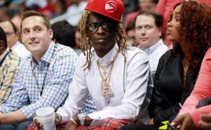 Apr 22, 2015; Atlanta, GA, USA; Musical artist Young Thug during the second quarter of game two of the first round of the NBA Playoffs between Brooklyn Nets and Atlanta Hawks at Philips Arena. Mandatory Credit: Kevin Liles-USA TODAY Sports