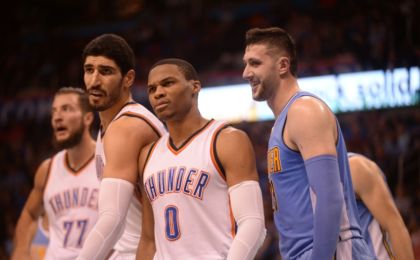 Oct 18, 2016; Oklahoma City, OK, USA; Oklahoma City Thunder guard Russell Westbrook (0) and Oklahoma City Thunder center Enes Kanter (11) react to a call as Denver Nuggets center Jusuf Nurkic (23) looks on during the second quarter at Chesapeake Energy Arena. Mandatory Credit: Mark D. Smith-USA TODAY Sports