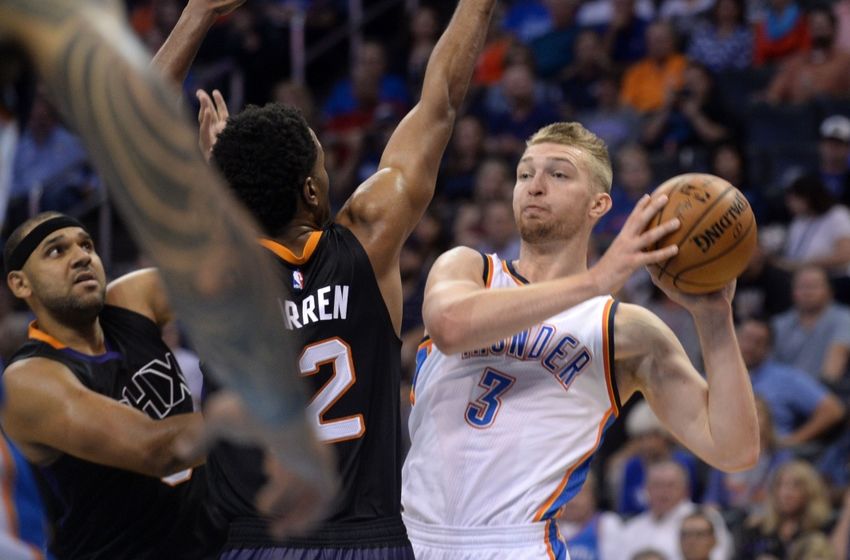 Oct 28, 2016; Oklahoma City, OK, USA; Oklahoma City Thunder forward Domantas Sabonis (3) handles the ball while guarded by Phoenix Suns forward T.J. Warren (12) during the first quarter at Chesapeake Energy Arena. Mandatory Credit: Mark D. Smith-USA TODAY Sports