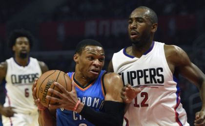 Nov 2, 2016; Los Angeles, CA, USA; Oklahoma City Thunder guard Russell Westbrook (0) drives the ball defended by Los Angeles Clippers forward Luc Mbah a Moute (12) during the first quarter at Staples Center. Mandatory Credit: Kelvin Kuo-USA TODAY Sports