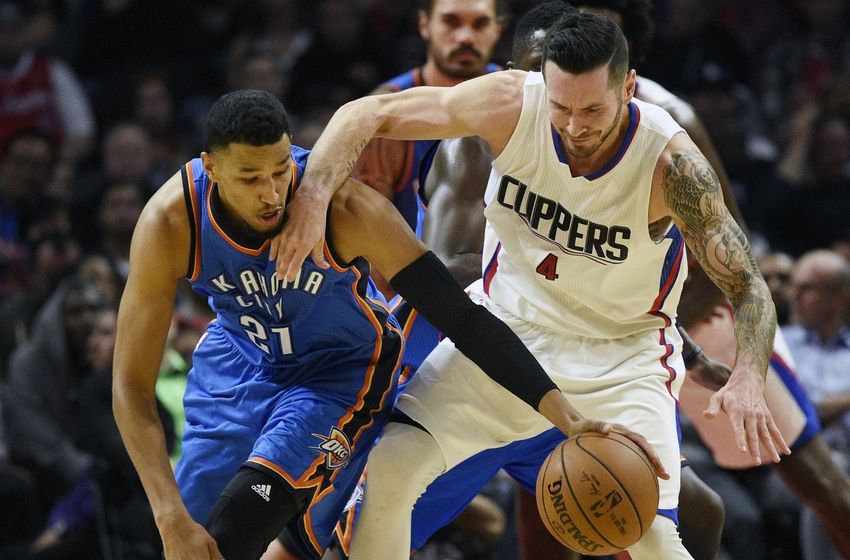 Nov 2, 2016; Los Angeles, CA, USA; Oklahoma City Thunder guard Andre Roberson (21) steals the ball from Los Angeles Clippers guard JJ Redick (4) during the second quarter at Staples Center. Mandatory Credit: Kelvin Kuo-USA TODAY Sports