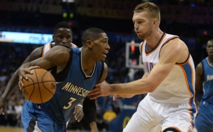 Nov 5, 2016; Oklahoma City, OK, USA; Minnesota Timberwolves guard Kris Dunn (3) drives to the basket against Oklahoma City Thunder forward Domantas Sabonis (3) during the first quarter at Chesapeake Energy Arena. Mandatory Credit: Mark D. Smith-USA TODAY Sports