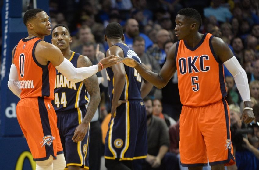 Nov 20, 2016; Oklahoma City, OK, USA; Oklahoma City Thunder guard Russell Westbrook (0) and Oklahoma City Thunder guard Victor Oladipo (5) react after a play against the Indiana Pacers during the second quarter at Chesapeake Energy Arena. Mandatory Credit: Mark D. Smith-USA TODAY Sports