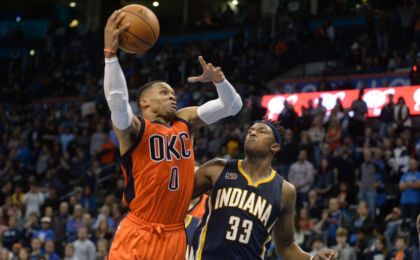 Nov 20, 2016; Oklahoma City, OK, USA; Oklahoma City Thunder guard Russell Westbrook (0) drives to the basket against Indiana Pacers center Myles Turner (33) during the fourth quarter at Chesapeake Energy Arena. Mandatory Credit: Mark D. Smith-USA TODAY Sports