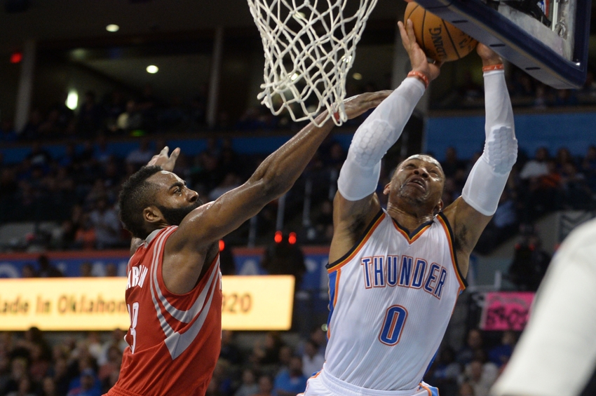 Nov 16, 2016; Oklahoma City, OK, USA; Oklahoma City Thunder guard Russell Westbrook (0) drives to the basket in front of Houston Rockets guard James Harden (13) during the fourth quarter at Chesapeake Energy Arena. Mandatory Credit: Mark D. Smith-USA TODAY Sports