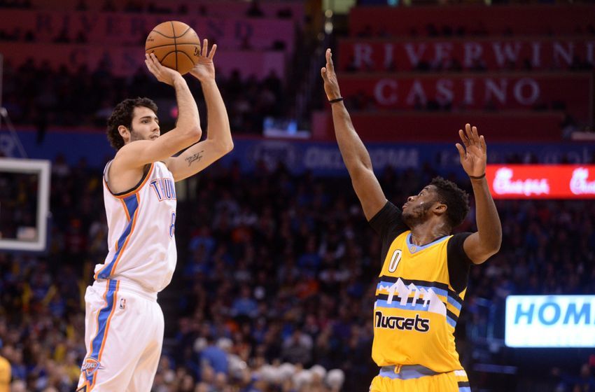 Jan 7, 2017; Oklahoma City, OK, USA; Oklahoma City Thunder guard Alex Abrines (8) shoots the ball over Denver Nuggets guard Emmanuel Mudiay (0) during the fourth quarter at Chesapeake Energy Arena. Mandatory Credit: Mark D. Smith-USA TODAY Sports