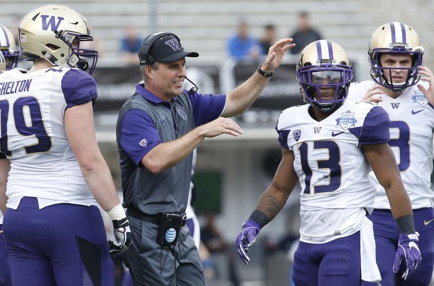 Dec 26, 2015; Dallas, TX, USA; Washington Huskies head coach Chris Peterson reacts after a play in the game against the Southern Miss Golden Eagles at Cotton Bowl Stadium. Mandatory Credit: Tim Heitman-USA TODAY Sports