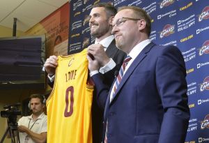 Aug 26, 2014; Independence, OH, USA; Cleveland Cavaliers player Kevin Love (left) and general manager David Griffin pose for photographers at Cleveland Clinic Courts. Mandatory Credit: David Richard-USA TODAY Sports