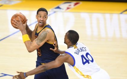 June 2, 2016; Oakland, CA, USA; Cleveland Cavaliers forward Channing Frye (9) controls the ball against Golden State Warriors forward Harrison Barnes (40) during the first half in game two of the NBA Finals at Oracle Arena. Mandatory Credit: Bob Donnan-USA TODAY Sports