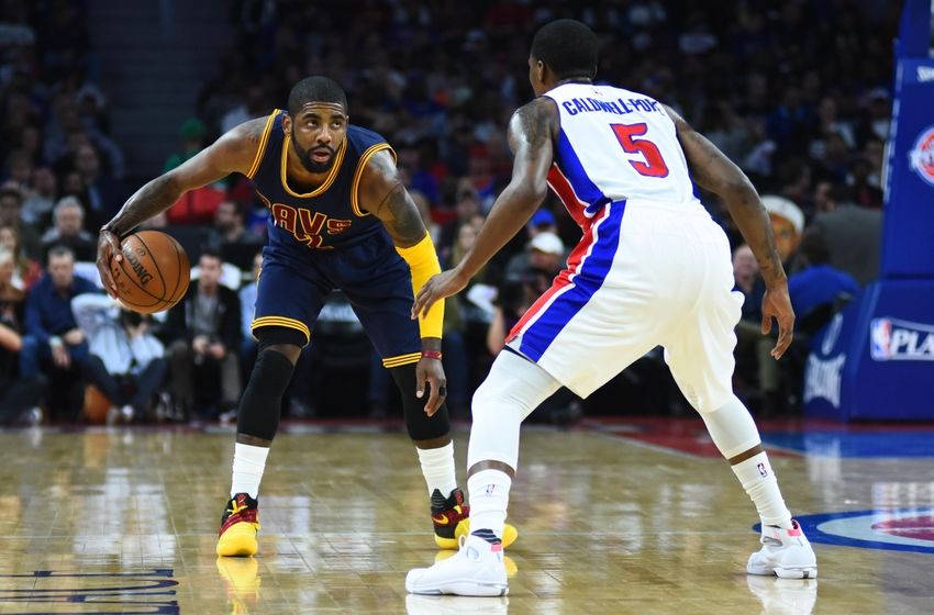 Apr 22, 2016; Auburn Hills, MI, USA; Cleveland Cavaliers guard Kyrie Irving (2) brings the ball up court as Detroit Pistons guard Kentavious Caldwell-Pope (5) defends during the first quarter in game three of the first round of the NBA Playoffs at The Palace of Auburn Hills. Mandatory Credit: Tim Fuller-USA TODAY Sports