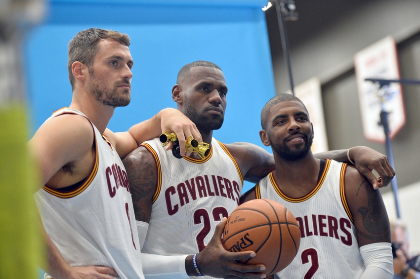 Sep 26, 2016; Cleveland, OH, USA; Cleveland Cavaliers forward Kevin Love (0), forward LeBron James (23) and guard Kyrie Irving (2) pose during a photo session during media day at Cleveland Clinic Courts. Mandatory Credit: Ken Blaze-USA TODAY Sports