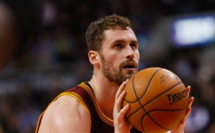 Mar 4, 2015; Toronto, Ontario, CAN; Cleveland Cavaliers forward Kevin Love (0) goes to throw a free throw against the Toronto Raptors at the Air Canada Centre. Cleveland defeated Toronto 120-112. Mandatory Credit: John E. Sokolowski-USA TODAY Sports