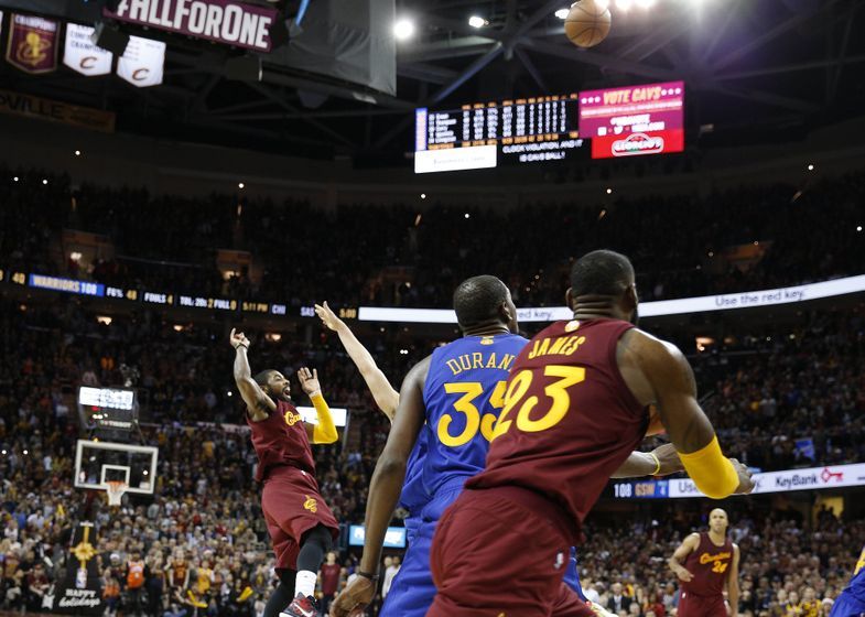 Dec 25, 2016; Cleveland, OH, USA; Cleveland Cavaliers guard Kyrie Irving (2) makes the winning shot against Golden State Warriors guard Klay Thompson (11) at Quicken Loans Arena. Cleveland defeats Golden State 109-108. Mandatory Credit: Brian Spurlock-USA TODAY Sports