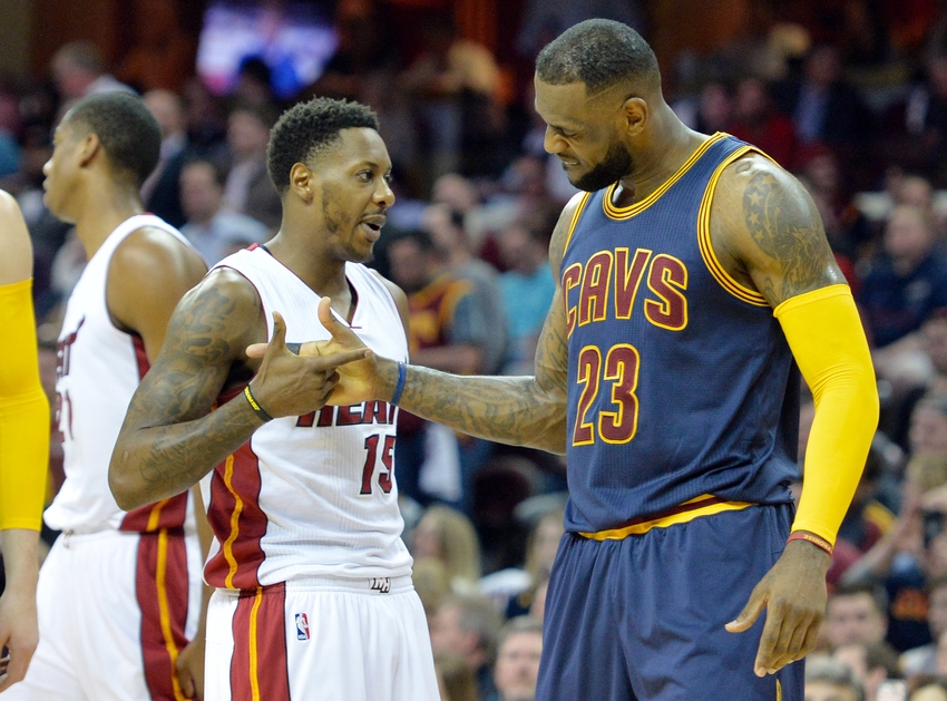 Apr 2, 2015; Cleveland, OH, USA; Cleveland Cavaliers forward LeBron James (23) shakes hands with Miami Heat guard Mario Chalmers (15) in the first quarter at Quicken Loans Arena. Mandatory Credit: David Richard-USA TODAY Sports