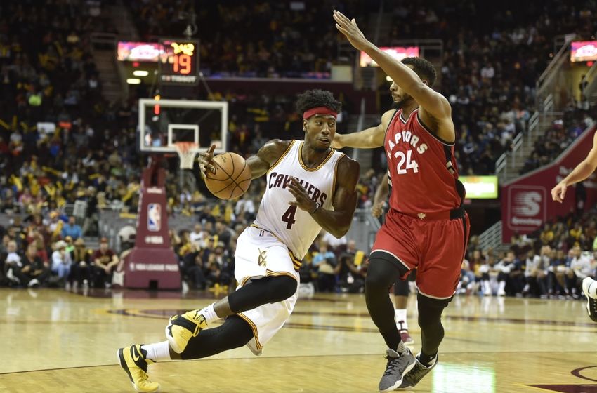 Oct 13, 2016; Cleveland, OH, USA; Cleveland Cavaliers guard Iman Shumpert (4) drives against Toronto Raptors guard Norman Powell (24) in the third quarter at Quicken Loans Arena. Mandatory Credit: David Richard-USA TODAY Sports