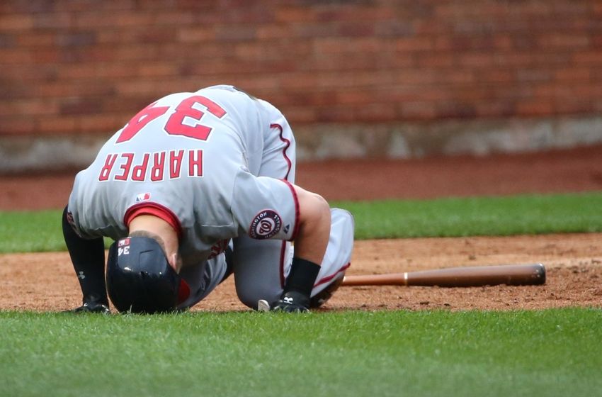 Oct 3, 2015; New York City, NY, USA; Washington Nationals right fielder Bryce Harper (34) is hit with a pitch during the sixth inning against the New York Mets at Citi Field. Washington Nationals won 3-1. Mandatory Credit: Anthony Gruppuso-USA TODAY Sports