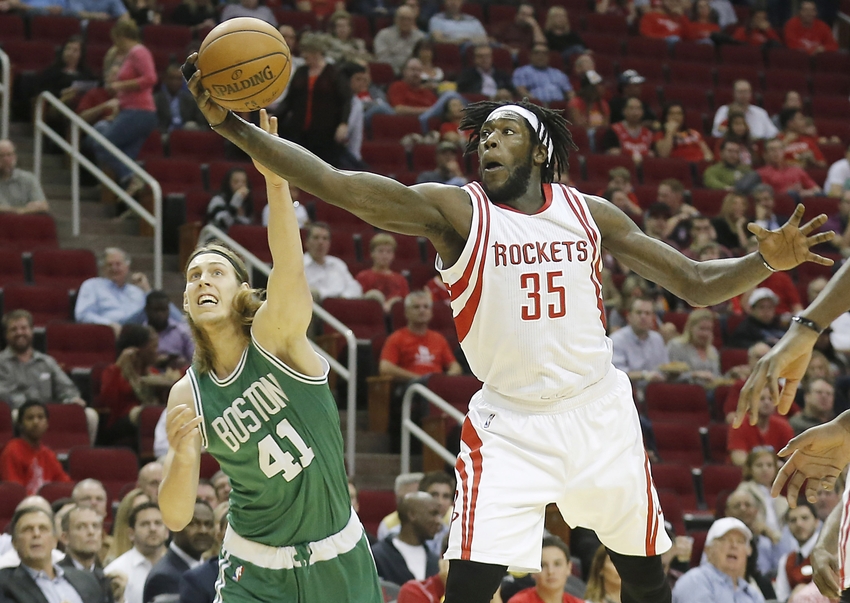 Nov 16, 2015; Houston, TX, USA; Boston Celtics center Kelly Olynyk (41) and Houston Rockets forward Montrezl Harrell (35) reach for a loose ball in the first quarter at Toyota Center. Mandatory Credit: Thomas B. Shea-USA TODAY Sports