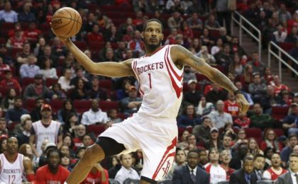 Jan 10, 2016; Houston, TX, USA; Houston Rockets forward Trevor Ariza (1) attempts to save a ball from going out of bounds during the third quarter against the Indiana Pacers at Toyota Center. The Rockets won 107-103 in overtime. Mandatory Credit: Troy Taormina-USA TODAY Sports