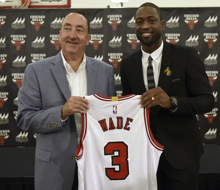 Jul 29, 2016; Chicago, IL, USA; Chicago Bulls guard Dwayne Wade (right) and Bulls general manager Gar Forman pose for a photo after addressing the media after a press conference at Advocate Center. Mandatory Credit: David Banks-USA TODAY Sports