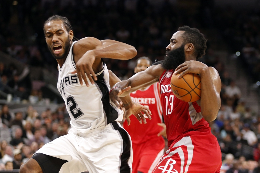 Nov 9, 2016; San Antonio, TX, USA; Houston Rockets shooting guard James Harden (13) drives to the basket while guarded by San Antonio Spurs small forward Kawhi Leonard (2) during the second half at AT&T Center. The rockets won 101-99. Mandatory Credit: Soobum Im-USA TODAY Sports