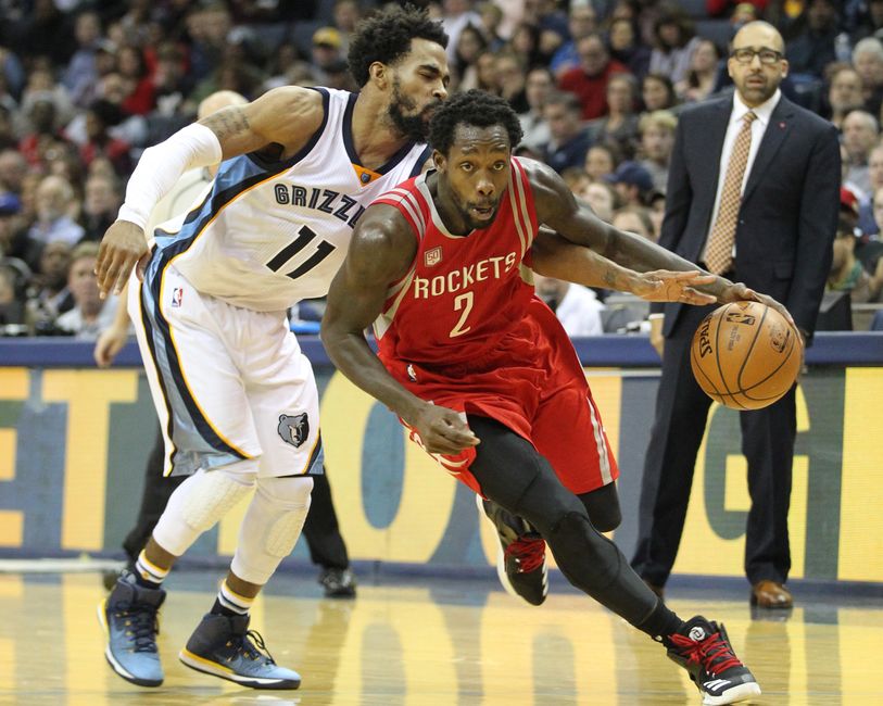 Dec 23, 2016; Memphis, TN, USA; Houston Rockets guard Patrick Beverley (2) drives as Memphis Grizzlies Mike Conley (11) attempts a steal the ball in the second half at FedExForum. Memphis defeated Houston 115-109. Mandatory Credit: Nelson Chenault-USA TODAY Sports