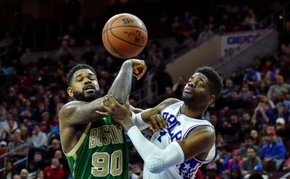 Mar 20, 2016; Philadelphia, PA, USA; Boston Celtics forward Amir Johnson (90) and Philadelphia 76ers forward Nerlens Noel (4) battle under the net during the fourth quarter of the game at the Wells Fargo Center. The Celtics won the game 120-105. Mandatory Credit: John Geliebter-USA TODAY Sports