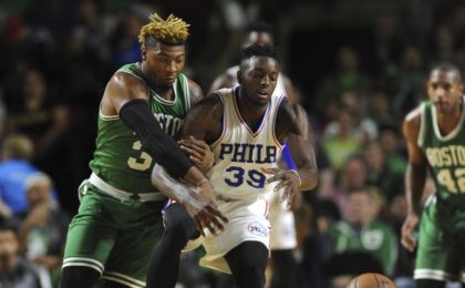 Oct 4, 2016; Amherst, MA, USA; Boston Celtics guard Marcus Smart (36) battles for the ball with Philadelphia 76ers forward Jerami Grant (39) during the first half at William D. Mullins Center. Mandatory Credit: Bob DeChiara-USA TODAY Sports