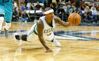 Oct 29, 2016; Charlotte, NC, USA; Boston Celtics guard Isaiah Thomas (4) tries to pass the ball while falling to the floor during the second half against the Charlotte Hornets at the Spectrum Center. The Celtics defeated the Hornets 104-98. Mandatory Credit: Jeremy Brevard-USA TODAY Sports
