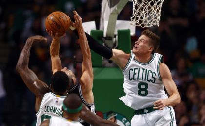 Nov 1, 2015; Boston, MA, USA; Boston Celtics forward Jonas Jerebko (8) defends San Antonio Spurs guard Manu Ginobili (20) during the first half at TD Garden. Mandatory Credit: Mark L. Baer-USA TODAY Sports