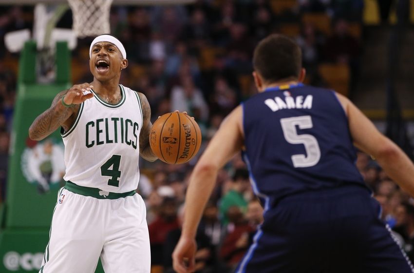 Nov 18, 2015; Boston, MA, USA; Boston Celtics guard Isaiah Thomas (4) returns the ball against Dallas Mavericks guard J.J. Barea (5) in the second half at TD Garden. Dallas defeated the Celtics 106-102. Mandatory Credit: David Butler II-USA TODAY Sports