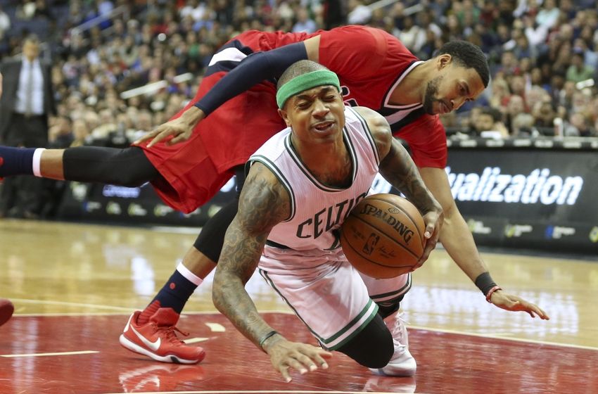 Jan 16, 2016; Washington, DC, USA; Boston Celtics guard Isaiah Thomas (4) fouled by Washington Wizards guard Garrett Temple (17) during the game at Verizon Center. Mandatory Credit: Mitch Stringer-USA TODAY Sports