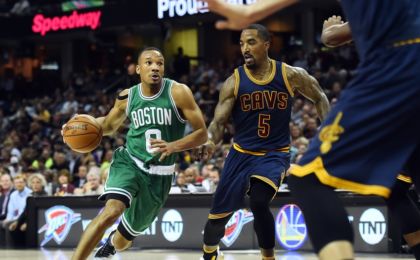 Nov 3, 2016; Cleveland, OH, USA; Boston Celtics guard Avery Bradley (0) drives to the basket as Cleveland Cavaliers guard J.R. Smith (5) defends during the second quarter at Quicken Loans Arena. The Cavs won 128-122. Mandatory Credit: Ken Blaze-USA TODAY Sports