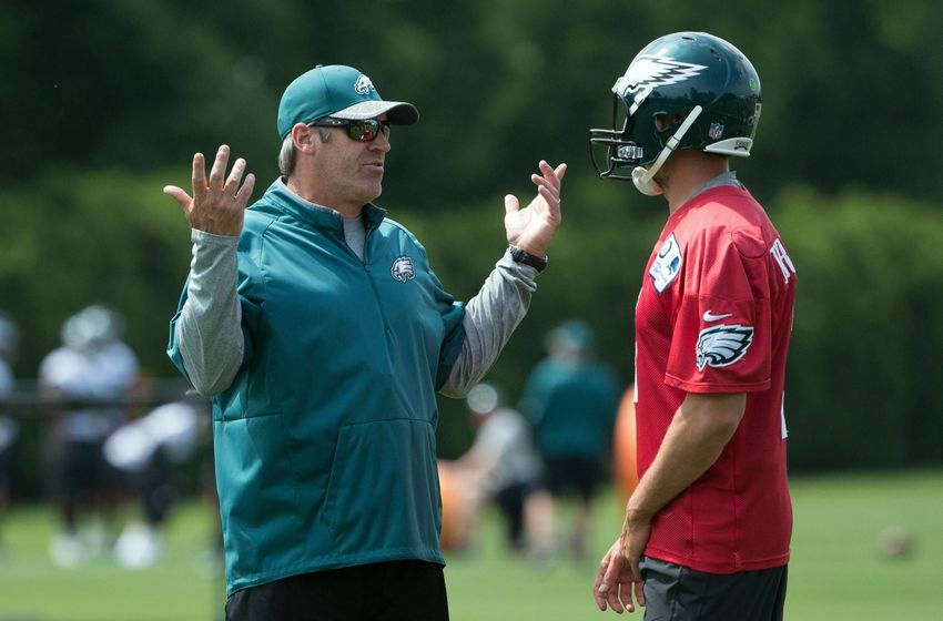 May 24, 2016; Philadelphia, PA, USA; Philadelphia Eagles head coach Doug Pederson talks with quarterback Sam Bradford (7) during OTS