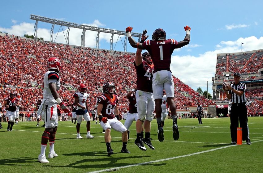 Sep 3, 2016; Blacksburg, VA, USA; Virginia Tech Hokies wide receiver Isaiah Ford (1) celebrates with fullback Sam Rogers (45) after scoring a touchdown against the Liberty Flames during the second quarter at Lane Stadium. Mandatory Credit: Peter Casey-USA TODAY Sports