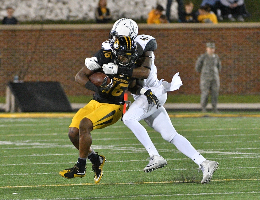 Nov 12, 2016; Columbia, MO, USA; Missouri Tigers running back Damarea Crockett (16) runs the ball and is tackled by Vanderbilt Commodores linebacker Zach Cunningham (41) during the second half at Faurot Field. Missouri won 26-17. Mandatory Credit: Denny Medley-USA TODAY Sports