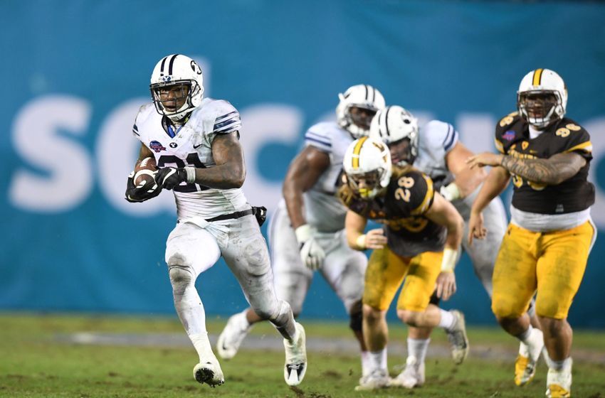 Dec 21, 2016; San Diego, CA, USA; Brigham Young Cougars running back Jamaal Williams (21) scores a touchdown in the fourth quarter against the Wyoming Cowboys during the 2016 Poinsettia Bowl at Qualcomm Stadium. Mandatory Credit: Kirby Lee-USA TODAY Sports