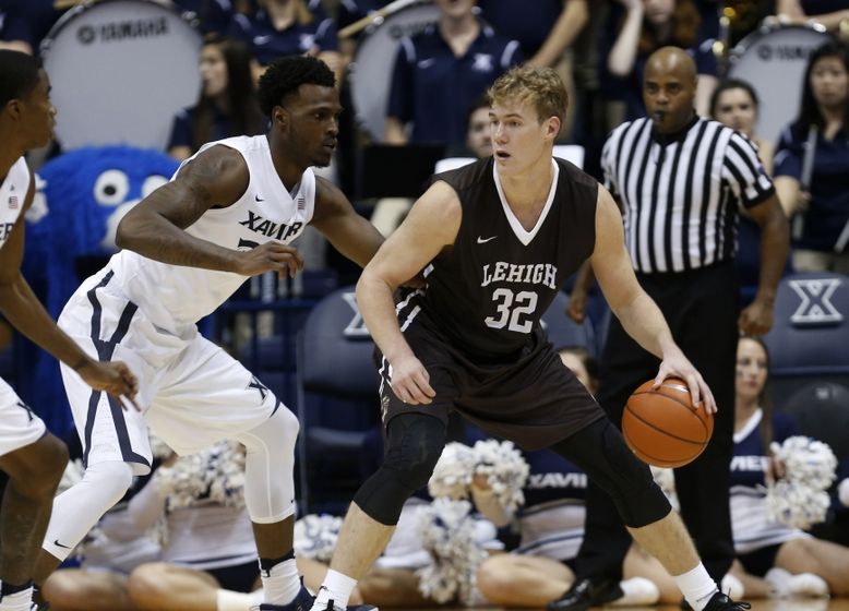 Nov 11, 2016; Cincinnati, OH, USA; Lehigh Mountain Hawks center Tim Kempton (32) is covered during the second half against the Xavier Musketeers forward RaShid Gaston (35) at the Cintas Center. Xavier won 84-81. Mandatory Credit: Frank Victores-USA TODAY Sports