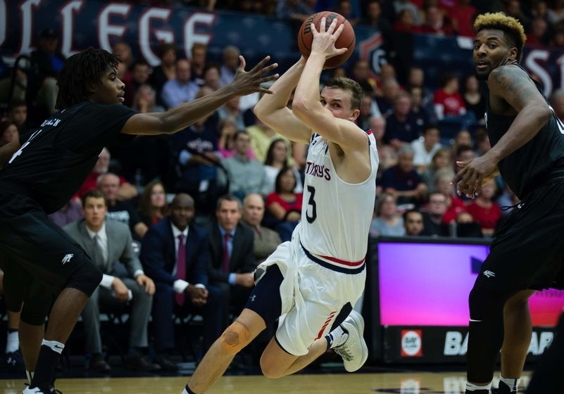 Nov 11, 2016; Moraga, CA, USA; St. Mary's Gaels guard Emmett Naar (3) drives in against Nevada Wolf Pack guard Lindsey Drew (14) during the second half at McKeon Pavilion. The St. Mary's Gaels defeated the Nevada Wolf Pack 81-63. Mandatory Credit: Kelley L Cox-USA TODAY Sports