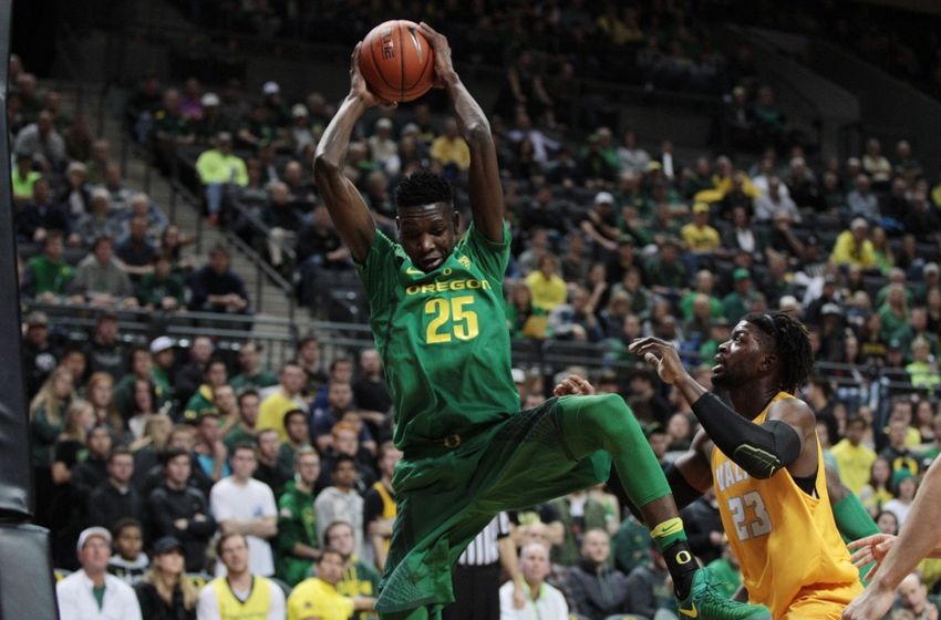 Nov 17, 2016; Eugene, OR, USA; Oregon Ducks forward Chris Boucher (25) grabs a rebound in the first half in front of Valparaiso Crusaders forward Jubril Adekoya (23) at Matthew Knight Arena. Mandatory Credit: Scott Olmos-USA TODAY Sports