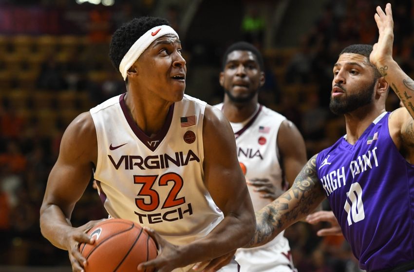 Nov 15, 2016; Blacksburg, VA, USA; Virginia Tech forward Zach LeDay (32) looks to shoot while being defended by High Point Panthers forward Tarique Thompson (10) in the second half at Cassell Coliseum. Virginia Tech defeated High Point 99-73. Mandatory Credit: Michael Shroyer-USA TODAY Sports