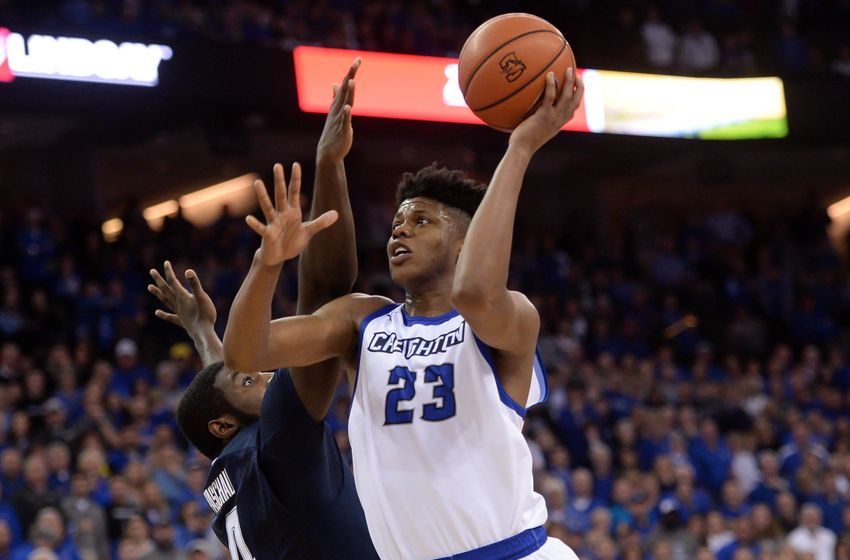 Dec 31, 2016; Omaha, NE, USA; Creighton Bluejays center Justin Patton (23) attempts a shot against Villanova Wildcats forward Eric Paschall (4) at CenturyLink Center Omaha. Villanova defeated Creighton 80-70. Mandatory Credit: Steven Branscombe-USA TODAY Sports