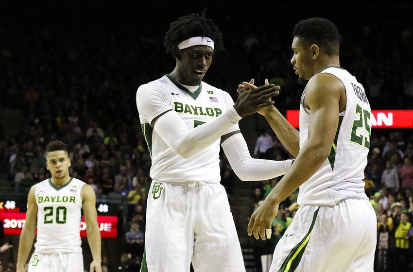 Jan 7, 2017; Waco, TX, USA; Baylor Bears forward Johnathan Motley (5) shakes the hand of guard Al Freeman (25) after picking up a foul against the Oklahoma State Cowboys during the second half at Ferrell Center. Baylor won 61-57. Mandatory Credit: Ray Carlin-USA TODAY Sports