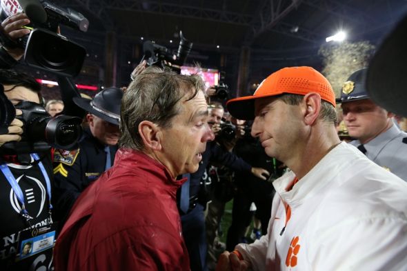Jan 11, 2016; Glendale, AZ, USA; Clemson Tigers head coach Dabo Swinney congratulates Alabama Crimson Tide head coach Nick Saban following the 45-40 victory in the 2016 CFP National Championship at University of Phoenix Stadium. Mandatory Credit: Matthew Emmons-USA TODAY Sports